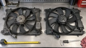 Old and replacement radiator fan assemblies compared for shroud size connectors modules and mounting tabs